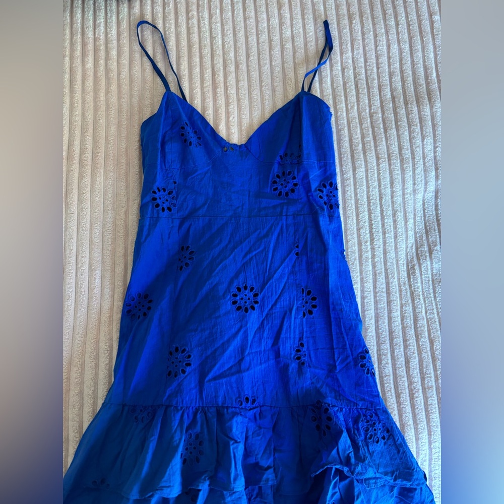 Bright blue dress with floral details